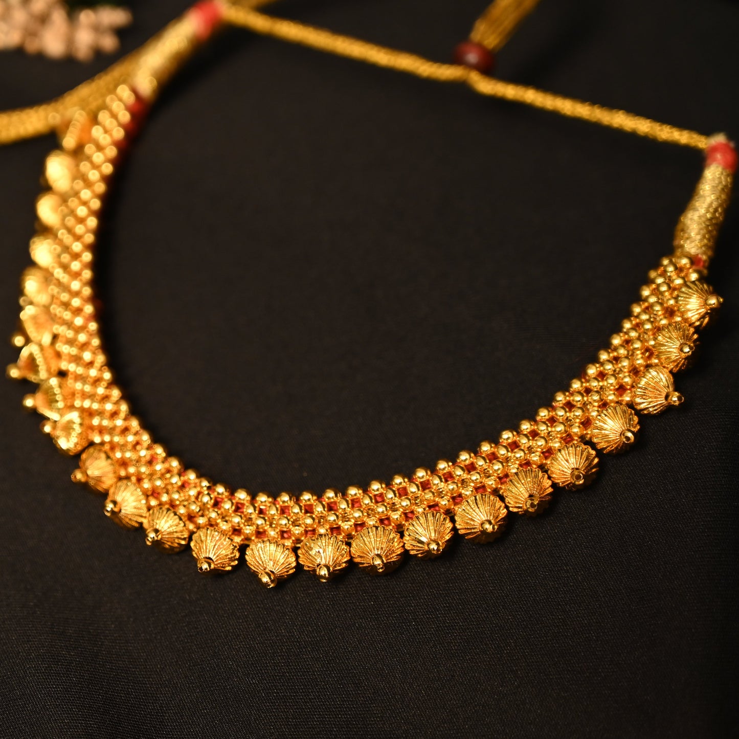 Kolhapuri-Mani Thushi