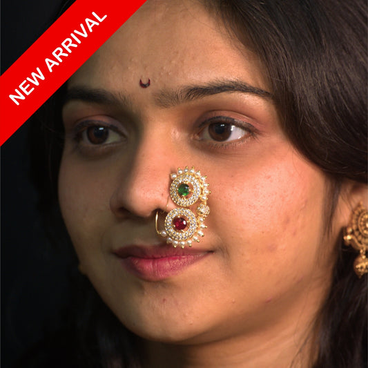 Nath Laxmi Vara
Ruby stone Maharashtrian nath
Pearl accent designer nath
Gold plated bridal nose ring
Traditional Maharashtrian jewelry
Festive ruby nath
Geometric design nath
Wedding Maharashtrian nose ring