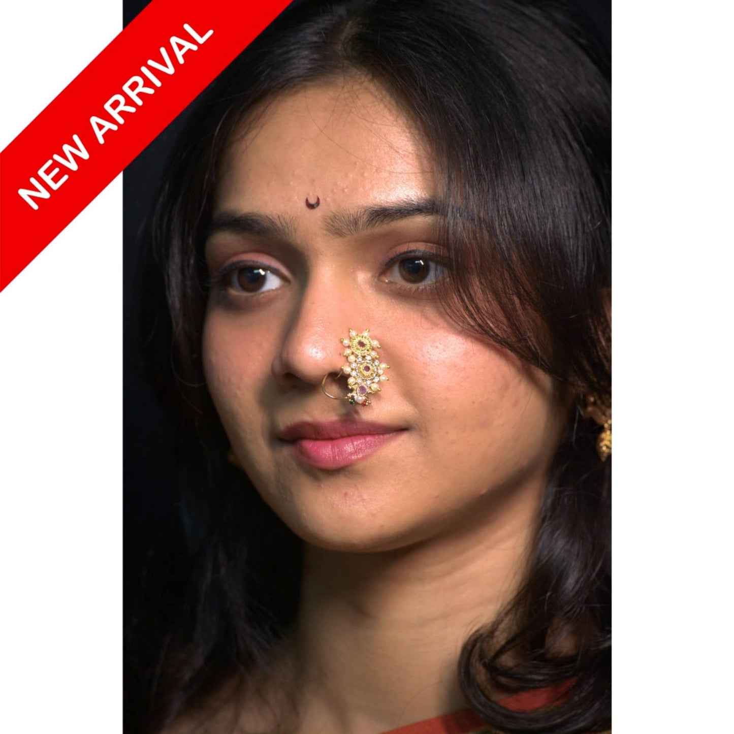 Nath Bhagirathi Royale
Maharashtrian bridal nath
Gold plated nose ring
Pearl and crystal nath
Traditional Maharashtrian jewelry
Wedding nose ring
Festive bridal nath
Bhagirathi pattern nath
Ethnic Maharashtrian nath
Designer bridal nose ring