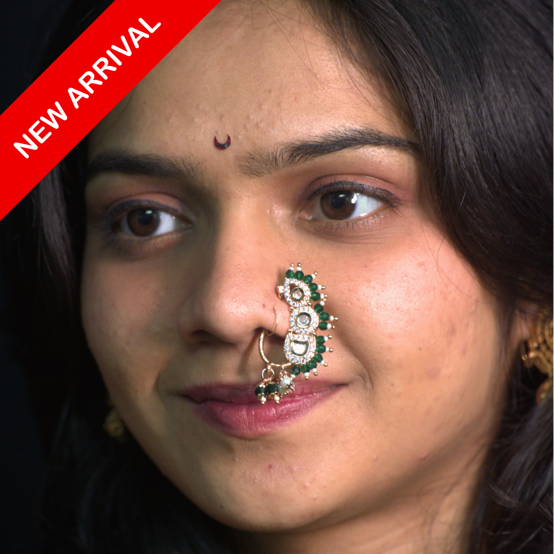 Nath Tarai Warrior
Maharashtrian bridal nath
White crystal and green bead nath
Traditional festive nose ring
Pearl and stone accent nath
Gold-plated statement nath
Designer bridal jewelry
Vertical cascade nath
Elegant wedding nath
Ethnic Maharashtrian accessory
