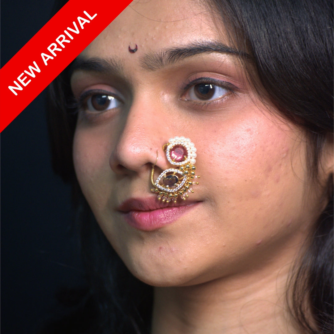 Nath Rangoli Spark
Bridal Maharashtrian nath
Ruby stone nath
Amethyst crystal nath
Pearl embellished nath
Gold plated bridal nose ring
Traditional Maharashtrian jewelry
Festive bridal nath
Designer ethnic nose ring
Wedding nose ring jewelry