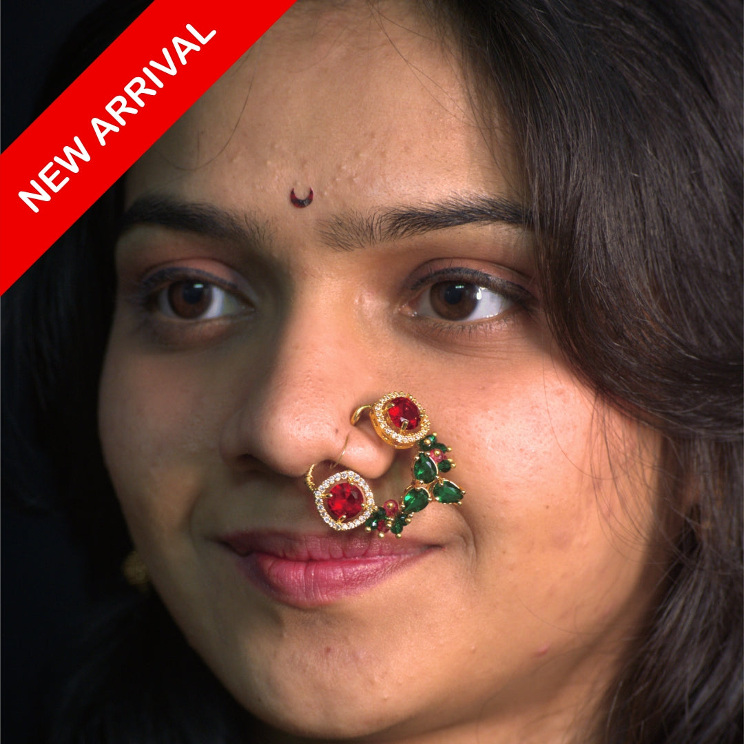 Nath Kamala Bloom
Maharashtrian bridal nath
Multicolor stone nath
Ruby green stone nose ring
Gold plated traditional nath
Designer Maharashtrian nath
Wedding statement nath
Festive Maharashtrian jewelry
Crescent style bridal nath
